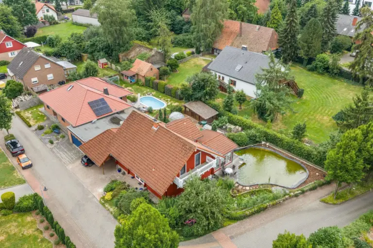 Vollholz Wohnblockhaus mit Wintergarten